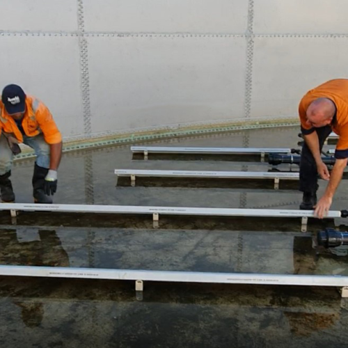 Installation of Aerostrip diffusers in an aeration tank.